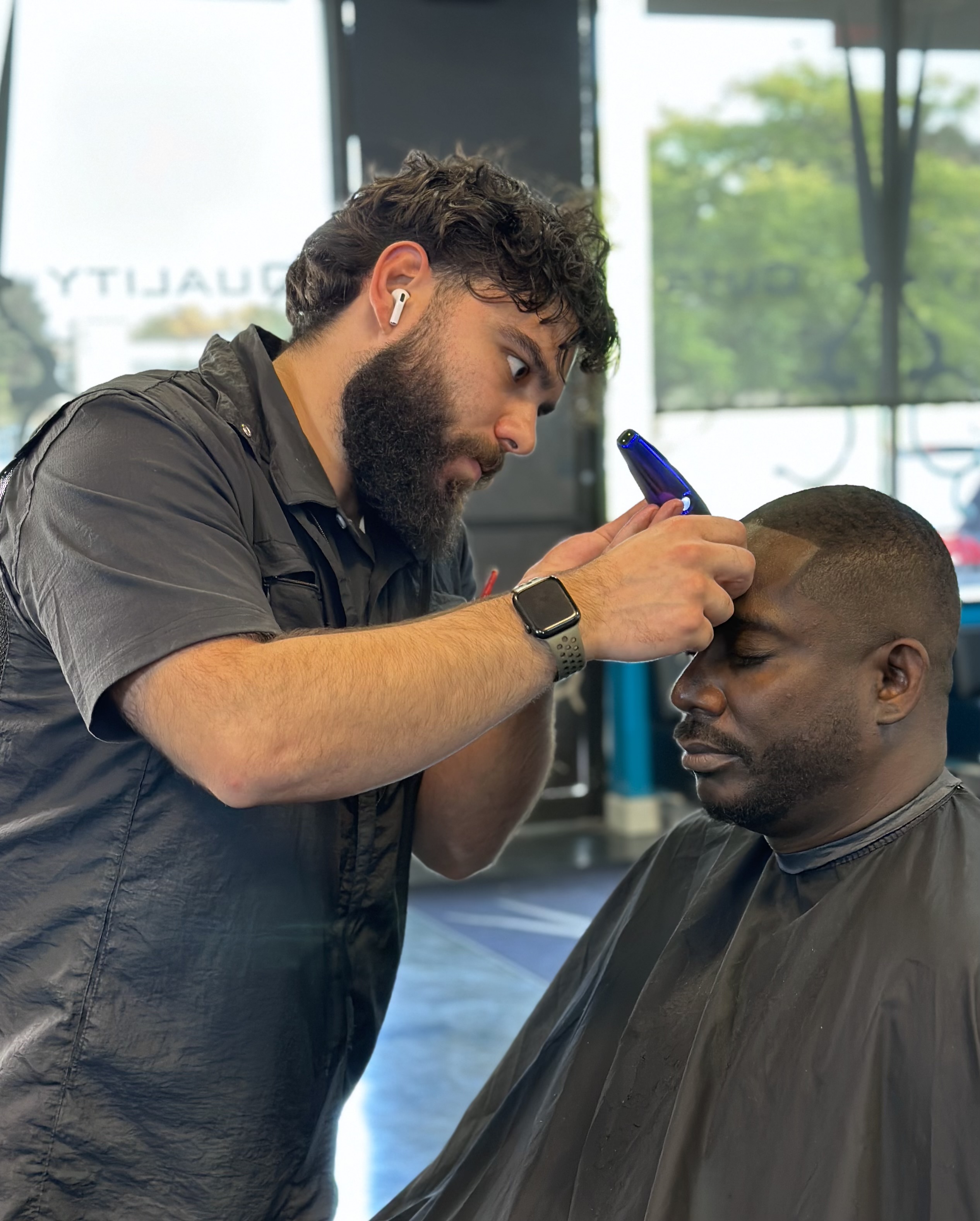 Fresh mid fade with clean beard line-up